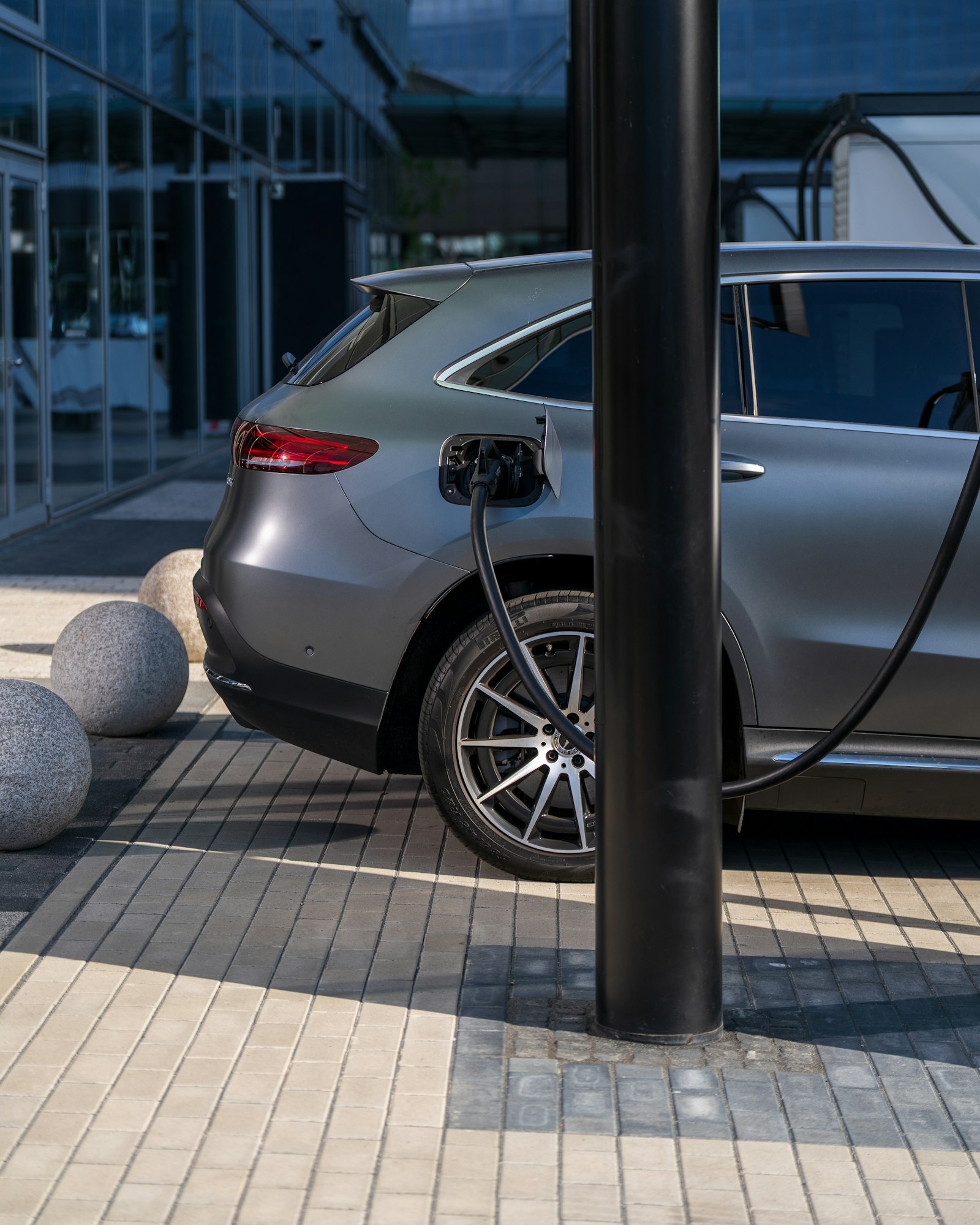 Electric vehicle at a public fast-charging station